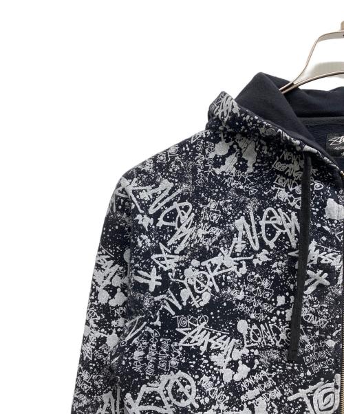 stussy（ステューシー）stussy (ステューシー) 総柄ジップパーカー ブラック サイズ:Mの古着・服飾アイテム