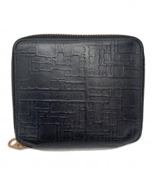 COMME des GARCONS（コムデギャルソン）の古着「型押しジップウォレット」｜ブラック