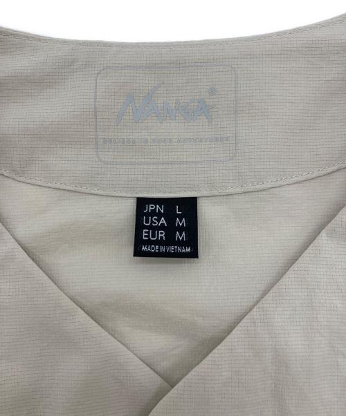 NANGA（ナンガ）NANGA (ナンガ) ドットエア コンフィ カーディガン アイボリー サイズ:JPN L　USA M　EUR Mの古着・服飾アイテム
