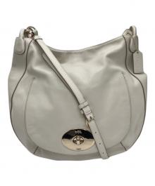 COACH（コーチ）の古着「ターンロックサークルホーボーバッグ」｜ホワイト
