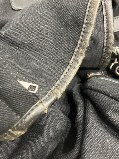 COMME des GARCONS HOMME（コムデギャルソン オム）COMME des GARCONS HOMME (コムデギャルソン オム) ウールミリタリーバックパック ブラックの古着・服飾アイテム