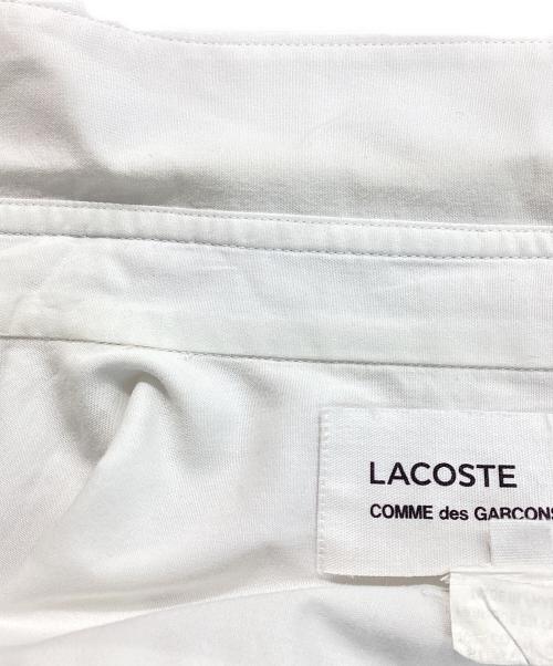 LACOSTE（ラコステ）LACOSTE (ラコステ) COMME des GARCONS SHIRT (コムデギャルソンシャツ) 23AW コラボロングシャツ ホワイト サイズ:XLの古着・服飾アイテム