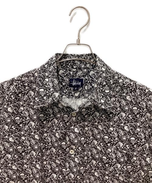 stussy（ステューシー）stussy (ステューシー) スカル総柄半袖シャツ グレー サイズ:Ｌの古着・服飾アイテム