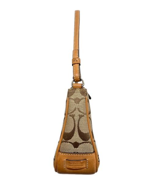 COACH（コーチ）COACH (コーチ) シグネチャー デミポーチ ブラウンの古着・服飾アイテム
