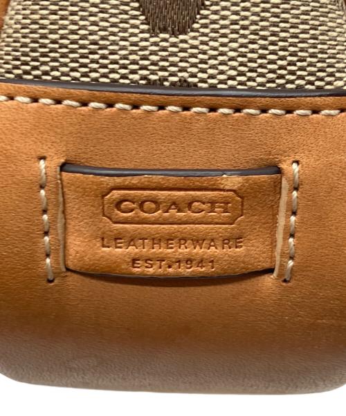 COACH（コーチ）COACH (コーチ) シグネチャー デミポーチ ブラウンの古着・服飾アイテム