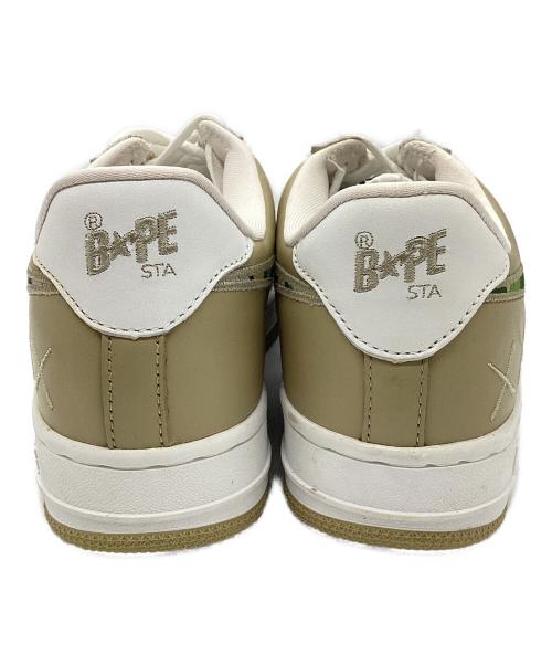 A BATHING APE（アベイシングエイプ）A BATHING APE (アベイシングエイプ) KAWS (カウズ) BAPESTA ベージュ×ホワイト サイズ:27ｃｍの古着・服飾アイテム