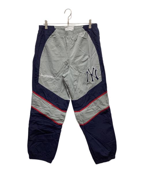 SUPREME（シュプリーム）Supreme (シュプリーム) GENUINE MERCHANDISE (ジェニュイン マーチャンダイズ) NY Yankees トラックパンツ ネイビー サイズ:Mの古着・服飾アイテム