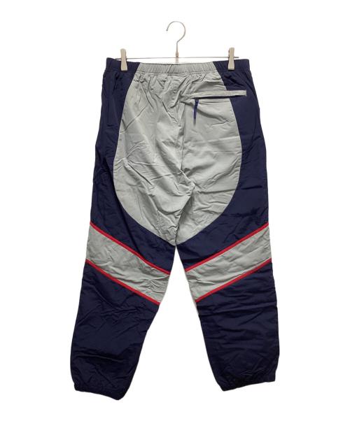 SUPREME（シュプリーム）Supreme (シュプリーム) GENUINE MERCHANDISE (ジェニュイン マーチャンダイズ) NY Yankees トラックパンツ ネイビー サイズ:Mの古着・服飾アイテム