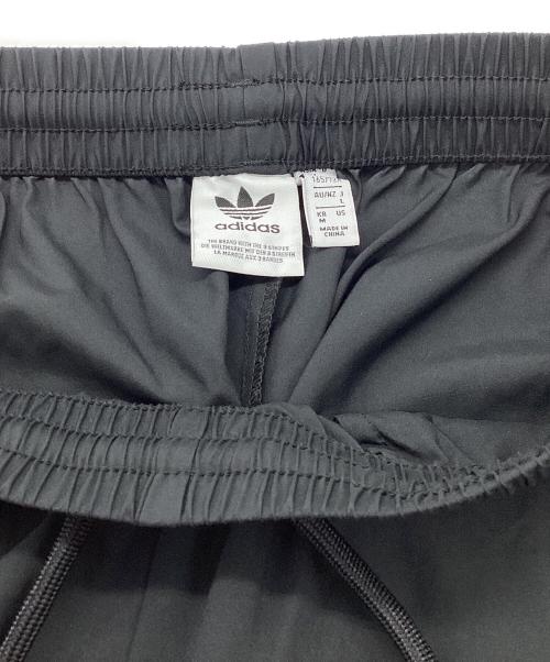 adidas（アディダス）adidas (アディダス) Adilenium オーバーサイズ トラックパンツ ブラック サイズ:Lの古着・服飾アイテム