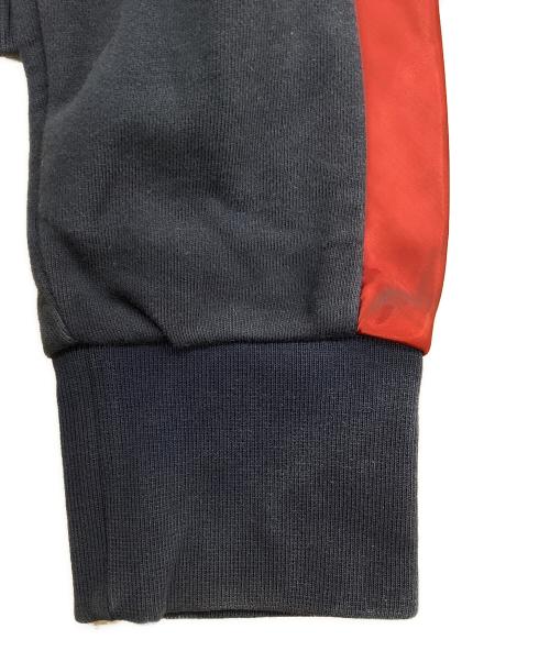 MONCLER GAMME BLEU（モンクレール ガム ブルー）MONCLER GAMME BLEU (モンクレール ガム ブルー) サイドラインブルゾン ブラック×レッド サイズ:Mの古着・服飾アイテム