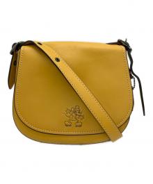 COACH×DISNEY（コーチ×ディズニー）の古着「フラップショルダーバッグ」｜イエロー