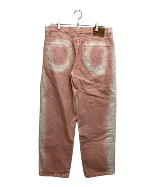 stussy（ステューシー）stussy (ステューシー) SPRAY DYE BIG OL' JEAN ピンク サイズ:32の古着・服飾アイテム