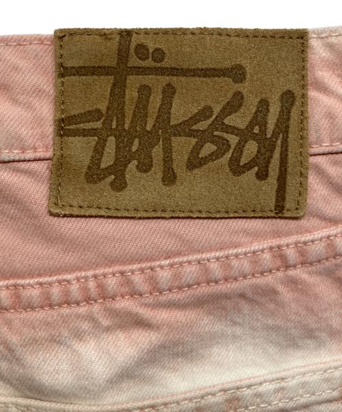 stussy（ステューシー）stussy (ステューシー) SPRAY DYE BIG OL' JEAN ピンク サイズ:32の古着・服飾アイテム