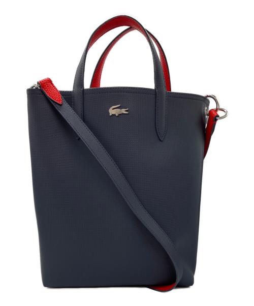 LACOSTE（ラコステ）LACOSTE (ラコステ) ANNAリバーシブル縦型 トートバッグ ネイビー×レッドの古着・服飾アイテム