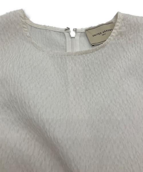 UNITED ARROWS TOKYO（ユナイテッドアローズトウキョウ）UNITED ARROWS TOKYO (ユナイテッドアローズトウキョウ) AIRY ジャカード 5SL ペプラム ブラウス ホワイト サイズ:38の古着・服飾アイテム