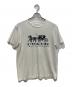 COACH（コーチ）の古着「HORSE AND CARRIAGE T-SHIRT」｜ホワイト