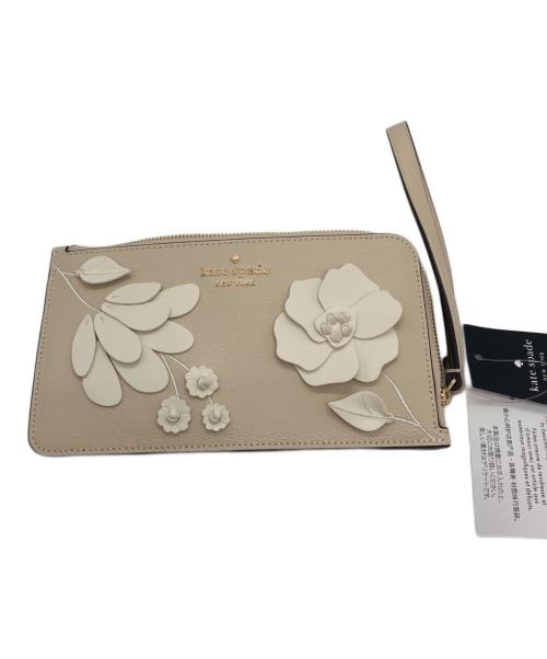 Kate Spade（ケイトスペード）Kate Spade (ケイトスペード) Lucy Floral Medium L-Zip Wristlet ベージュの古着・服飾アイテム