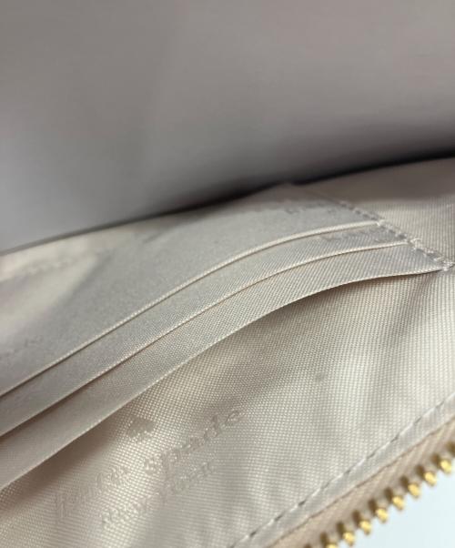 Kate Spade（ケイトスペード）Kate Spade (ケイトスペード) Lucy Floral Medium L-Zip Wristlet ベージュの古着・服飾アイテム