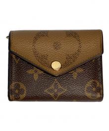 LOUIS VUITTON（ルイ ヴィトン）の古着「3つ折り財布」｜ブラウン
