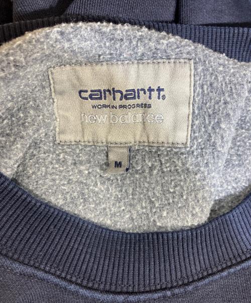 CarHartt（カーハート）CarHartt (カーハート) NEW BALANCE (ニューバランス) クルーネックスウェット ネイビー サイズ:Mの古着・服飾アイテム