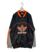 adidasアディダス）の古着「トラックジャケット」｜ブラック×オレンジ