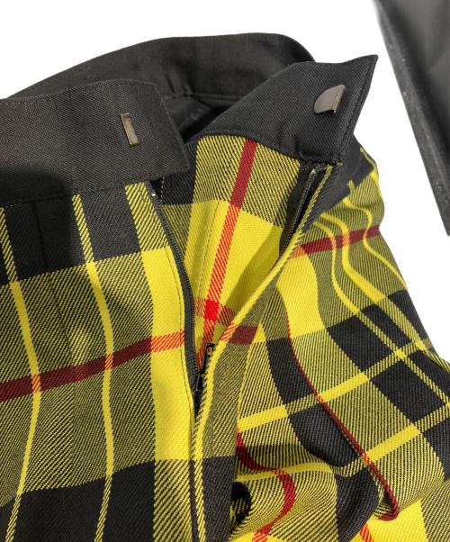 JUNYA WATANABE COMME des GARCONS（(ジュンヤワタナベ コムデギャルソン）JUNYA WATANABE COMME des GARCONS ((ジュンヤワタナベ コムデギャルソン) ドッキングスカート イエロー×ブラック サイズ:XSの古着・服飾アイテム