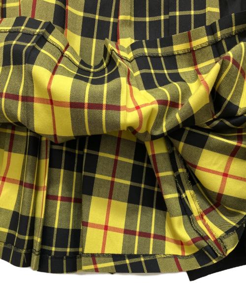 JUNYA WATANABE COMME des GARCONS（(ジュンヤワタナベ コムデギャルソン）JUNYA WATANABE COMME des GARCONS ((ジュンヤワタナベ コムデギャルソン) ドッキングスカート イエロー×ブラック サイズ:XSの古着・服飾アイテム