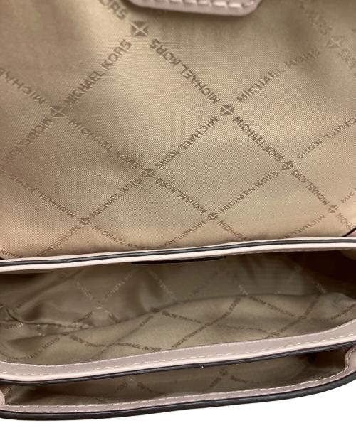 MICHAEL KORS（マイケルコース）MICHAEL KORS (マイケルコース) Jet Set Travel Small Pebbled Leather Crossbody Bag With Pouch ライトピンクの古着・服飾アイテム