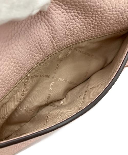 MICHAEL KORS（マイケルコース）MICHAEL KORS (マイケルコース) Jet Set Travel Small Pebbled Leather Crossbody Bag With Pouch ライトピンクの古着・服飾アイテム