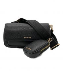 MICHAEL KORS（マイケルコース）の古着「Jet Set Travel Small Pebbled Leather Crossbody Bag With Pouch」｜ブラック