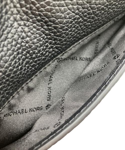 MICHAEL KORS（マイケルコース）MICHAEL KORS (マイケルコース) Jet Set Travel Small Pebbled Leather Crossbody Bag With Pouch ブラックの古着・服飾アイテム