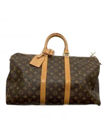 LOUIS VUITTON（ルイ ヴィトン）の古着「トラベルバッグ」｜ブラウン