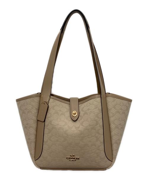 COACH（コーチ）COACH (コーチ) ハドリー ターンロック トート バッグ・シグネチャー キャンバス ベージュの古着・服飾アイテム