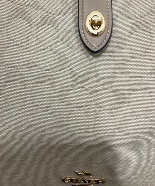 COACH（コーチ）COACH (コーチ) ハドリー ターンロック トート バッグ・シグネチャー キャンバス ベージュの古着・服飾アイテム