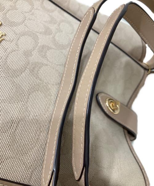 COACH（コーチ）COACH (コーチ) ハドリー ターンロック トート バッグ・シグネチャー キャンバス ベージュの古着・服飾アイテム