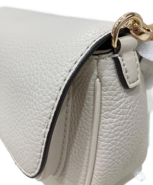 MICHAEL KORS（マイケルコース）MICHAEL KORS (マイケルコース) Jet Set Travel Small Pebbled Leather Crossbody Bag アイボリー 未使用品の古着・服飾アイテム