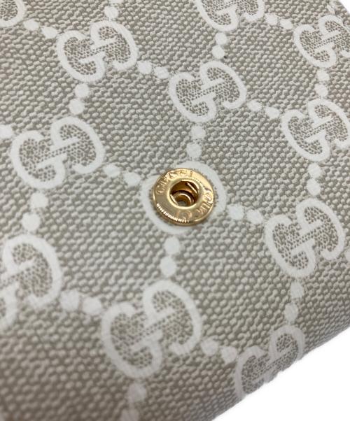GUCCI（グッチ）GUCCI (グッチ) ダブルG バイカラー ミニ ウォレット ベージュの古着・服飾アイテム