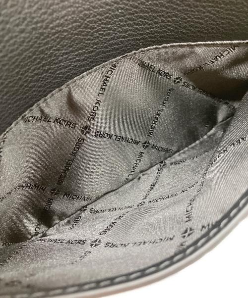 MICHAEL KORS（マイケルコース）MICHAEL KORS (マイケルコース) JET SET TRAVEL ショルダーバッグ ブラック 未使用品の古着・服飾アイテム