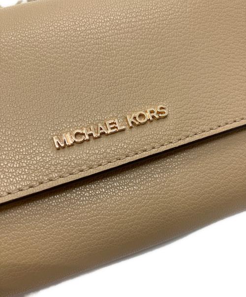 MICHAEL KORS（マイケルコース）MICHAEL KORS (マイケルコース) JET SET ITEM ジップアラウンド ウォレット クロスボディ ベージュ 未使用品の古着・服飾アイテム