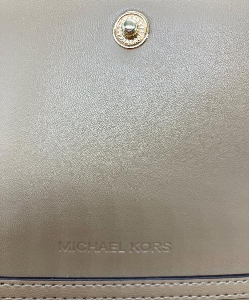 MICHAEL KORS（マイケルコース）MICHAEL KORS (マイケルコース) JET SET ITEM ジップアラウンド ウォレット クロスボディ ベージュ 未使用品の古着・服飾アイテム