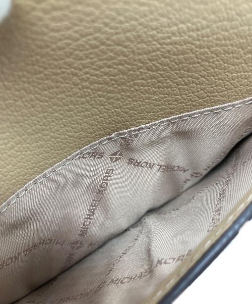 MICHAEL KORS（マイケルコース）MICHAEL KORS (マイケルコース) JET SET ITEM ジップアラウンド ウォレット クロスボディ ベージュ 未使用品の古着・服飾アイテム