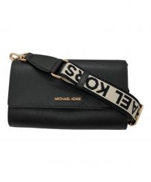 MICHAEL KORS（マイケルコース）の古着「JET SET ITEM ジップアラウンド ウォレット クロスボディ」｜ブラック