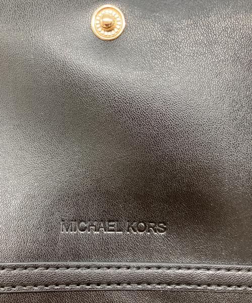 MICHAEL KORS（マイケルコース）MICHAEL KORS (マイケルコース) JET SET ITEM ジップアラウンド ウォレット クロスボディ ブラック 未使用品の古着・服飾アイテム