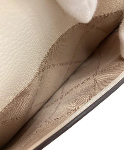 MICHAEL KORS（マイケルコース）MICHAEL KORS (マイケルコース) JET SET ITEM ジップアラウンド ウォレット クロスボディ ホワイトの古着・服飾アイテム