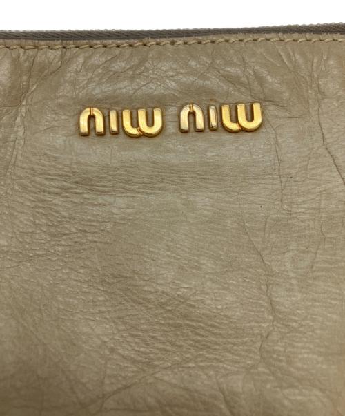 MIU MIU（ミュウミュウ）MIU MIU (ミュウミュウ) VITELLO LUX サイドリボン2WAYバッグ ベージュの古着・服飾アイテム
