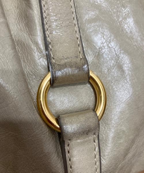 MIU MIU（ミュウミュウ）MIU MIU (ミュウミュウ) VITELLO LUX サイドリボン2WAYバッグ ベージュの古着・服飾アイテム