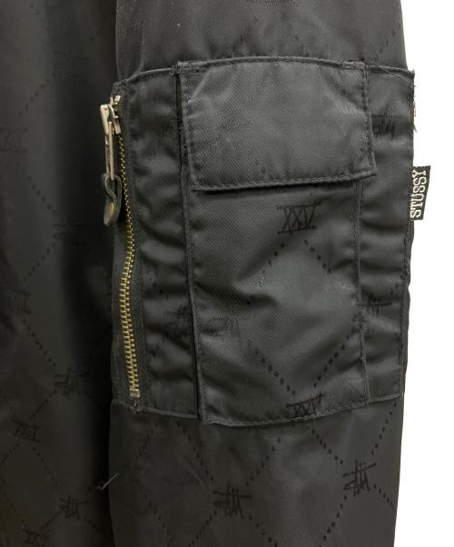 stussy（ステューシー）stussy (ステューシー) モノグラムMA-1ジャケット ブラック サイズ:Sの古着・服飾アイテム