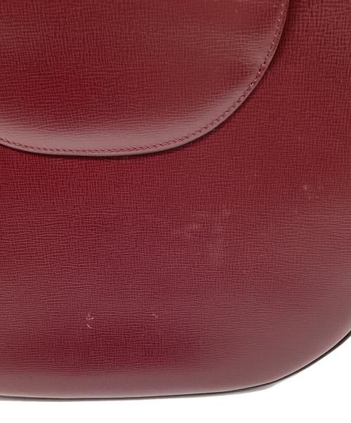 Cartier（カルティエ）Cartier (カルティエ) ターンロック ハンドバッグ ワインレッドの古着・服飾アイテム