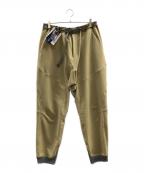 and wanderアンドワンダー）の古着「ライトストレッチシェルパンツ」｜カーキ