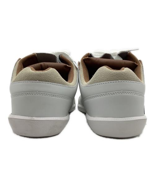 via SANGACIO（ヴィア・サンガチオ）via SANGACIO (ヴィア・サンガチオ) Brandalised (ブランダライズド) バンクシーコラボ　スニーカー ベージュ×ホワイト サイズ:26cm 未使用品の古着・服飾アイテム